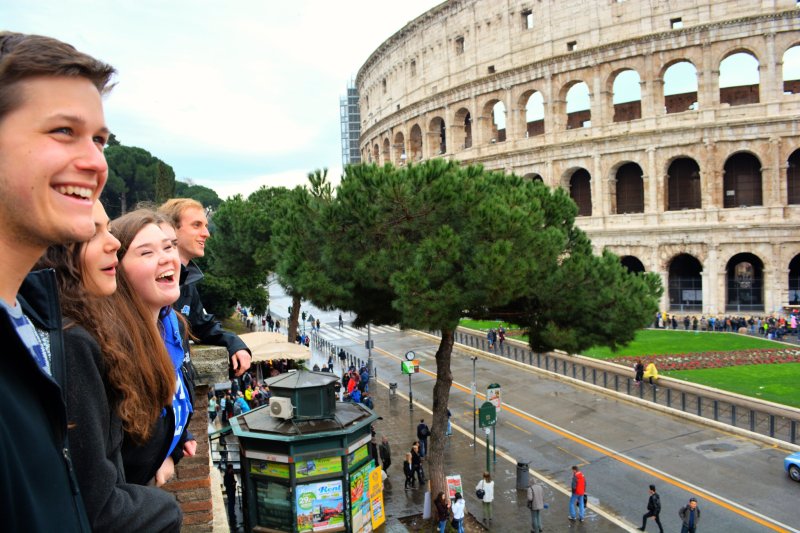 Students standing outside the Flavian Amphitheatre in Rome